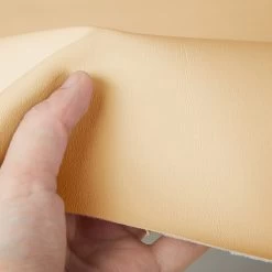 Nauga Soft Cream 54" Vinyl Fabric -Famous Fabric Store Nauga Soft Vinyl Cream 54 3